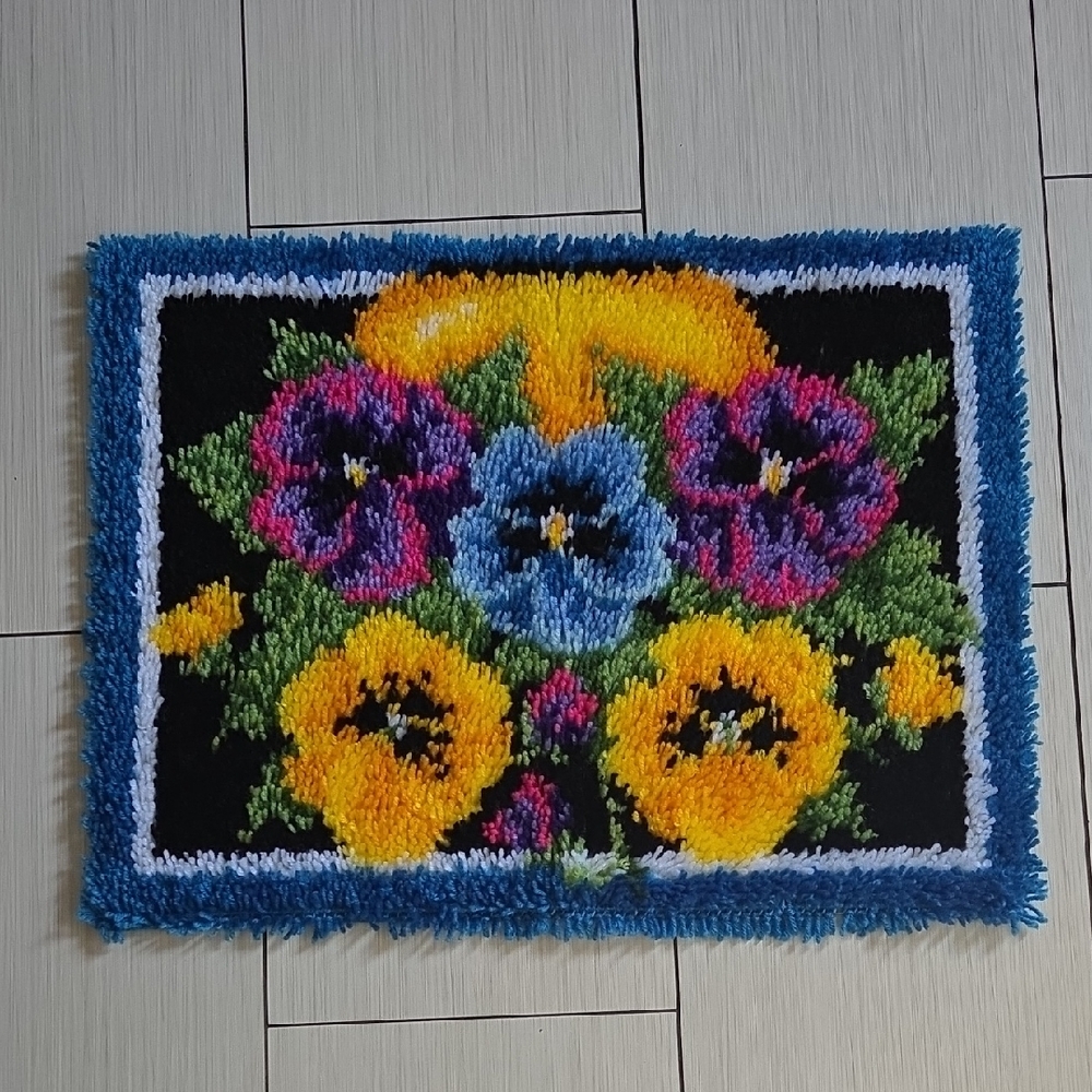 Completed Caron Wonderart Pot of Pansies Rug